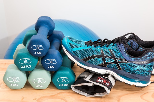 dumbells and trainers
