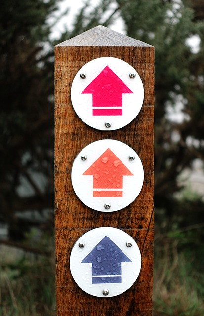 Wooden post with alternative route markings