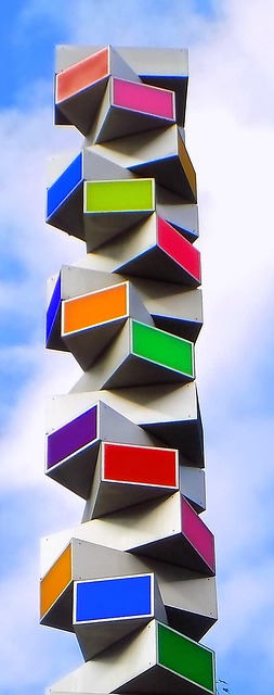 multi-colour building blocks stacking into the sky